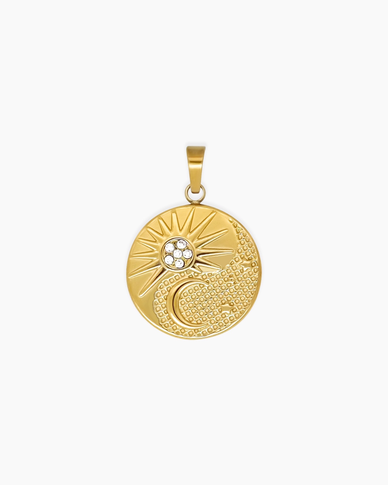 A round pendant with a textured gold-tone surface, a sparkling sunburst, and a crescent moon motif