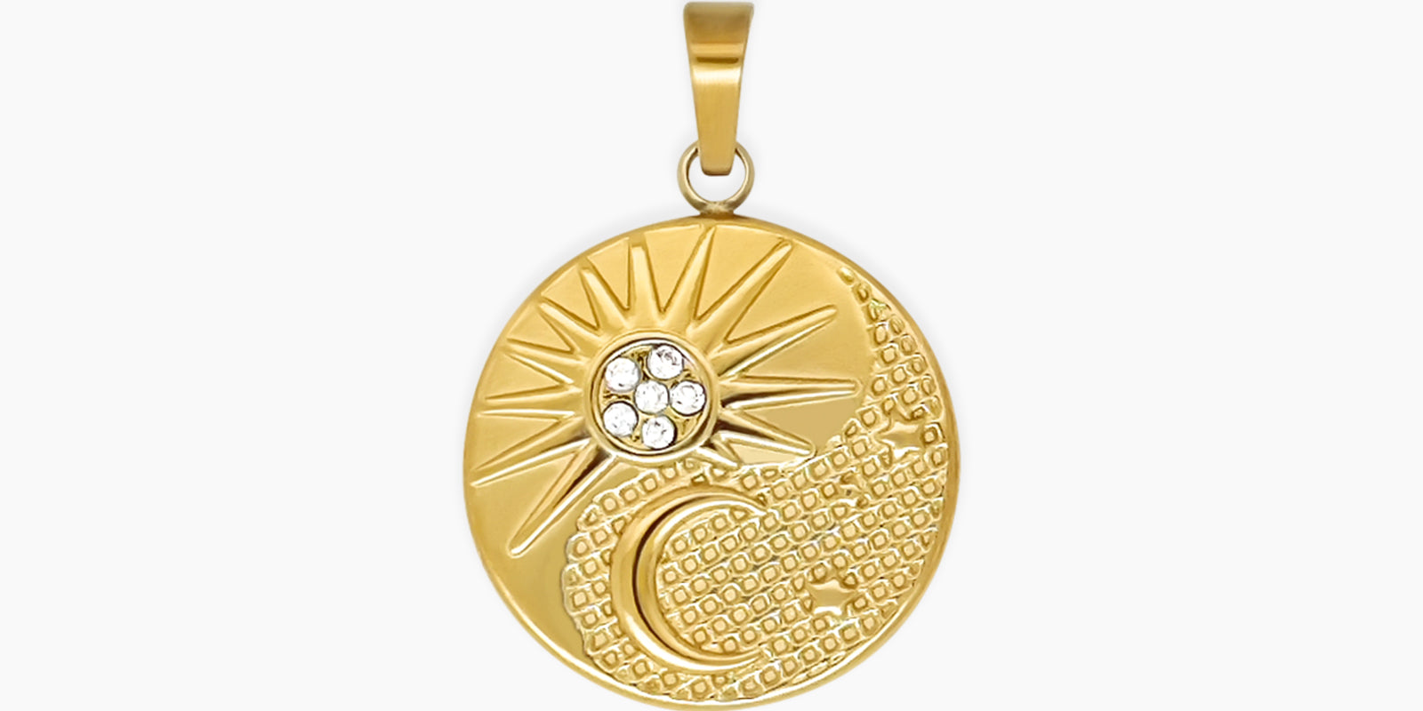 A round pendant with a textured gold-tone surface, a sparkling sunburst, and a crescent moon motif