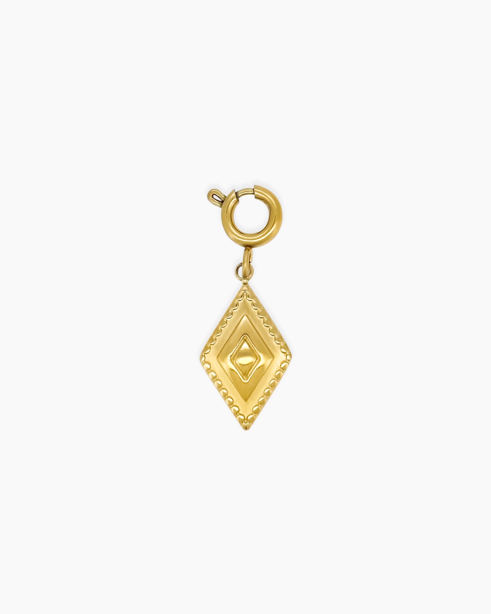 A pendant with a softly sculpted diamond-shaped charm framed with beaded detailing and a spring clasp