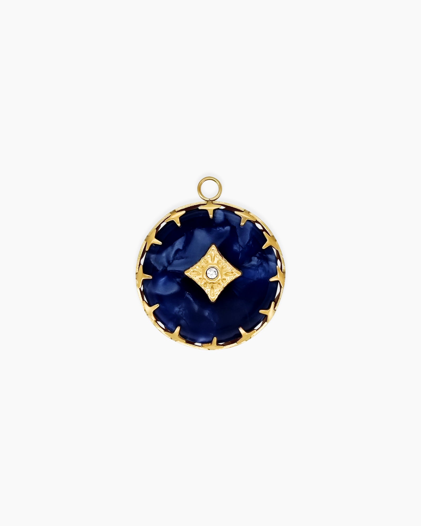 A pendant with a rich, swirling navy-blue base, a textured golden star, and a single crystal