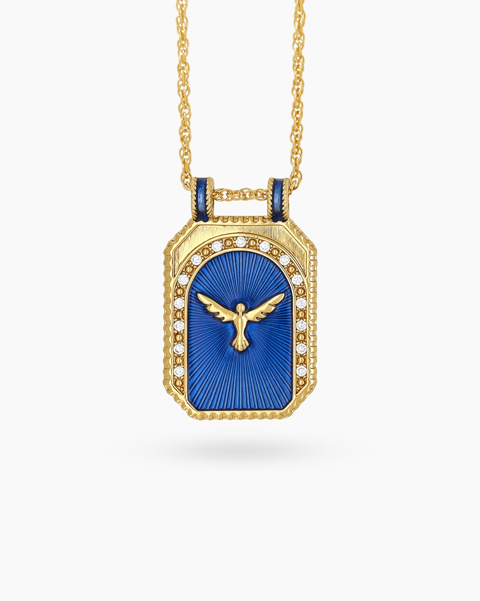 A keepsake-style necklace with a sculpted Brick Red Evil Eye pendant and sunbeam detailing on a twisted chain