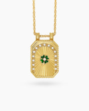 A keepsake-style necklace with a sculpted Green Clover pendant and sunbeam detailing on a twisted chain