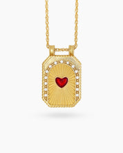 A keepsake-style necklace with a sculpted Red Heart pendant and sunbeam detailing on a twisted chain
