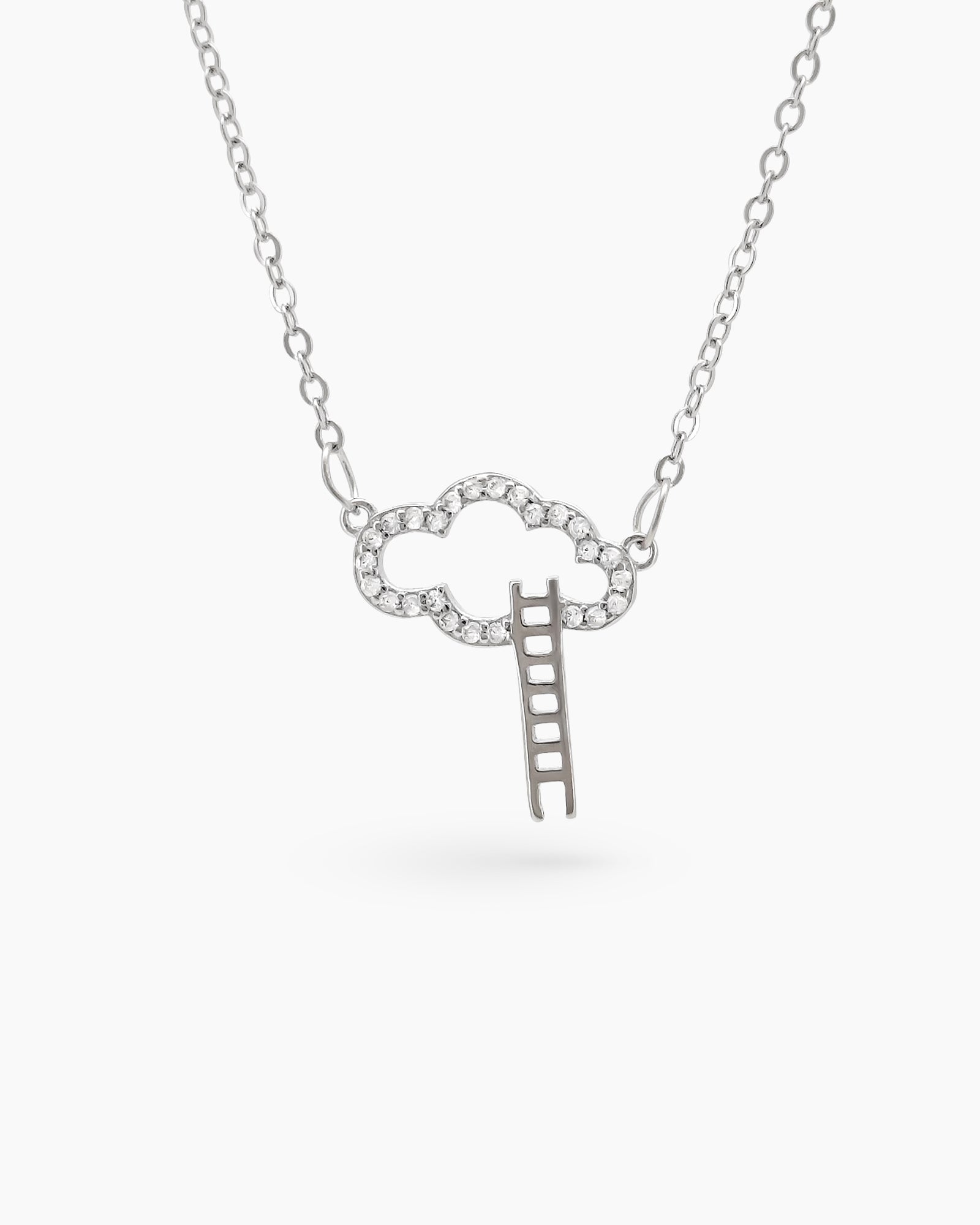 A necklace with a cloud-shaped pendant set with shimmering zircon stones and a tiny dangling ladder charm