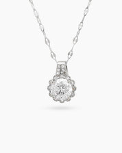 A necklace with a brilliant-cut white zircon pendant, framed by a sparkling halo of micro-set stones