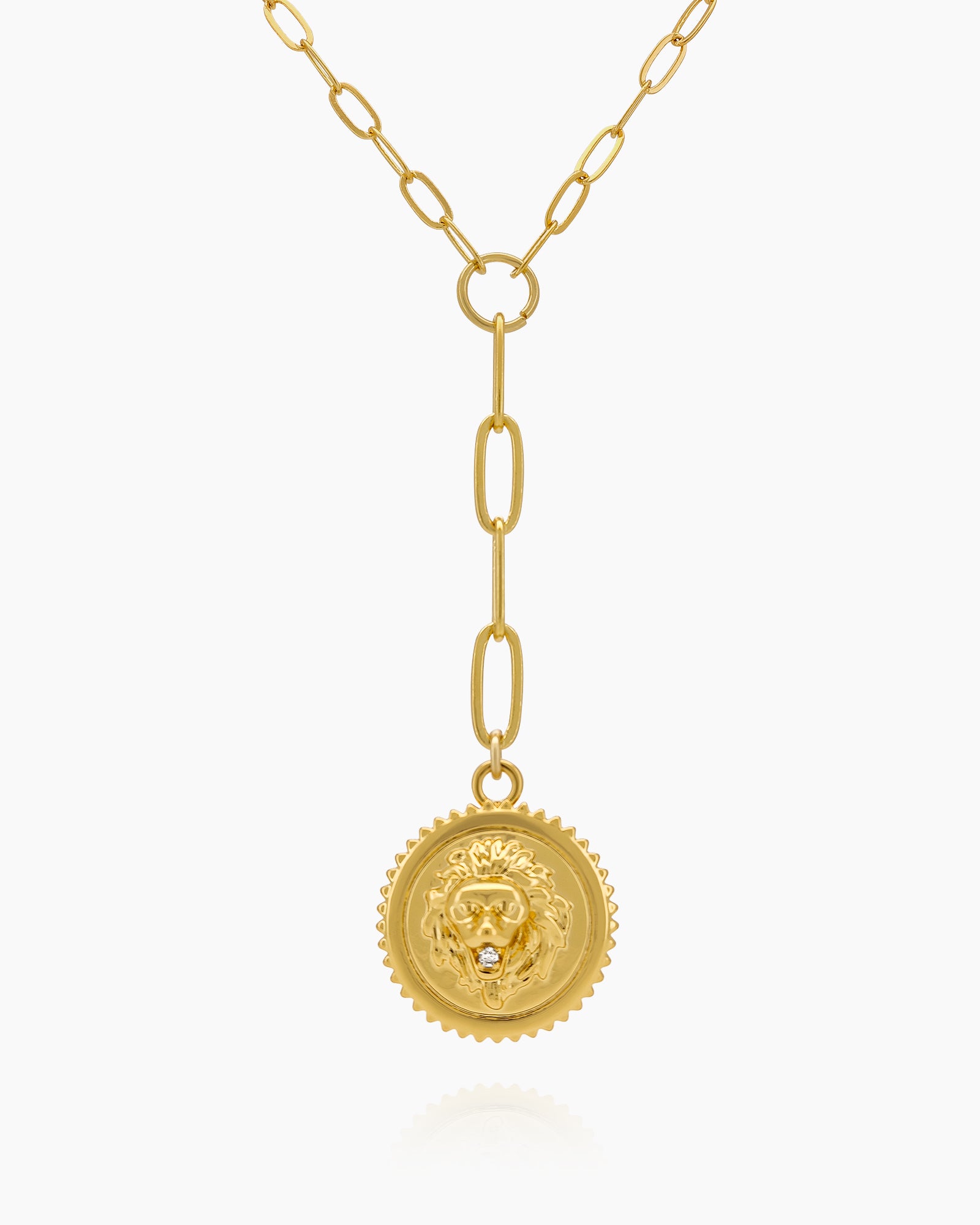 A Y-shaped necklace with a bold lion medallion and elongated paperclip chain links for a regal aesthetic