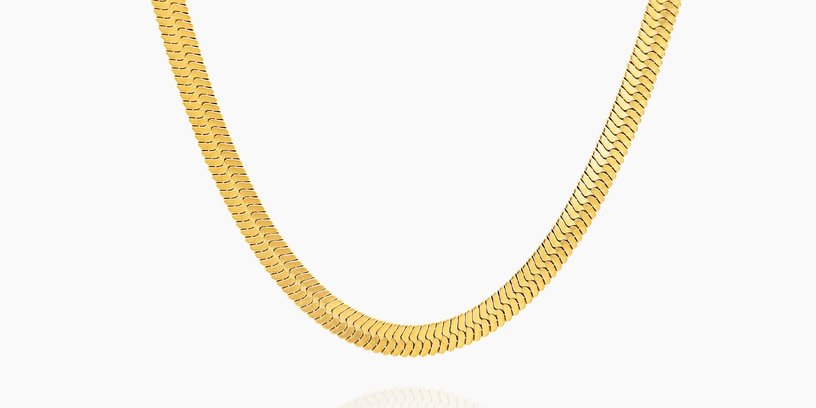 A gold-tone snake chain necklace that is smooth, flexible, and sits flat against the skin