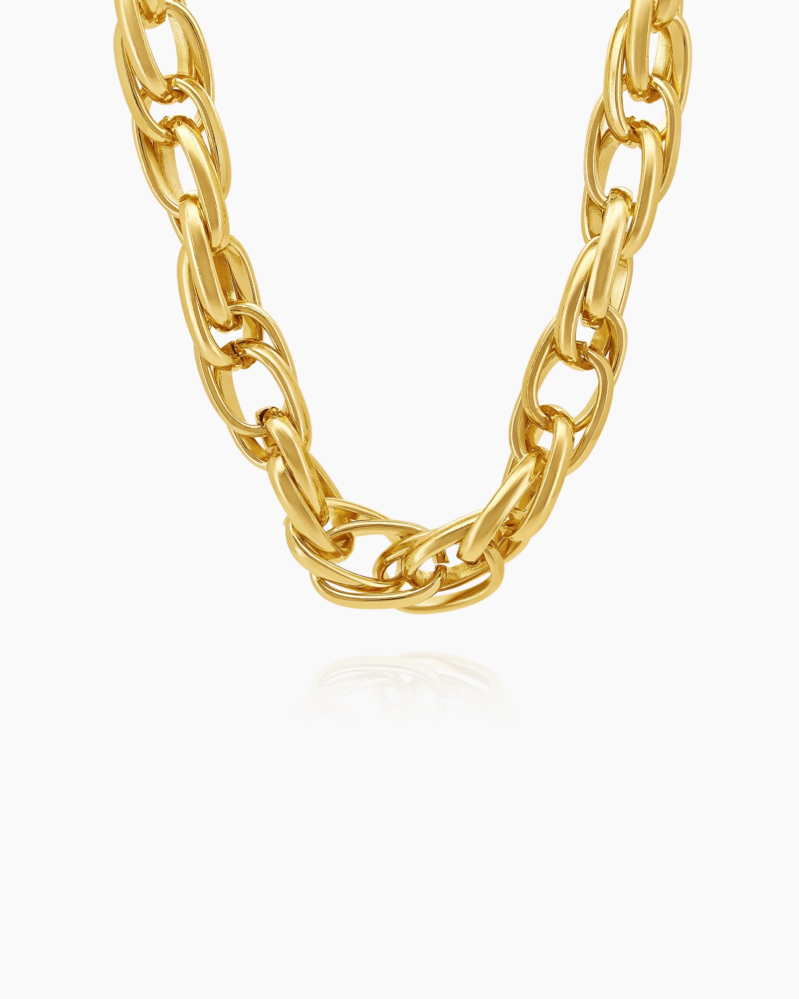 A necklace of interwoven gold-tone links in a sleek rope-style design for a classic, statement look