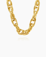 A necklace of interwoven gold-tone links in a sleek rope-style design for a classic, statement look