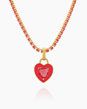 A rose-red tennis necklace with a full strand of zircon stones and an enamel heart charm with a center stone