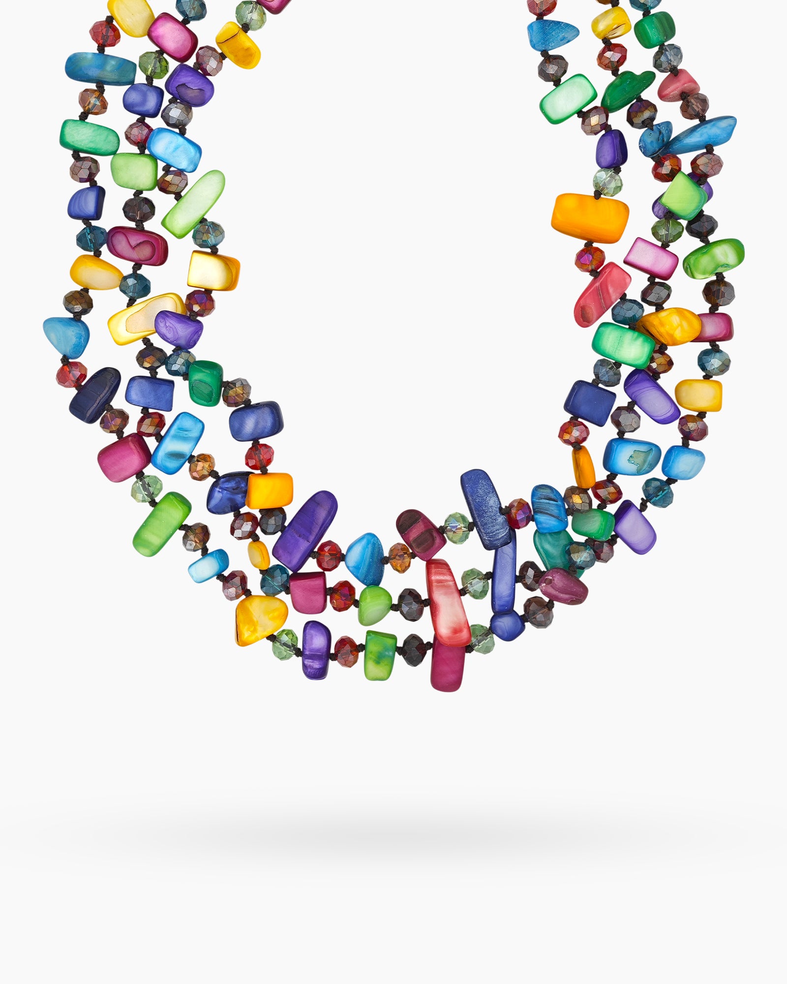 A double-stranded necklace with an eclectic mix of irregular shell chips and faceted glass beads