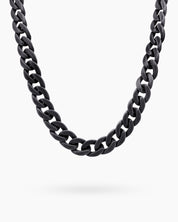 A glasses chain in black with oversized, glossy color links for a playful and practical statement