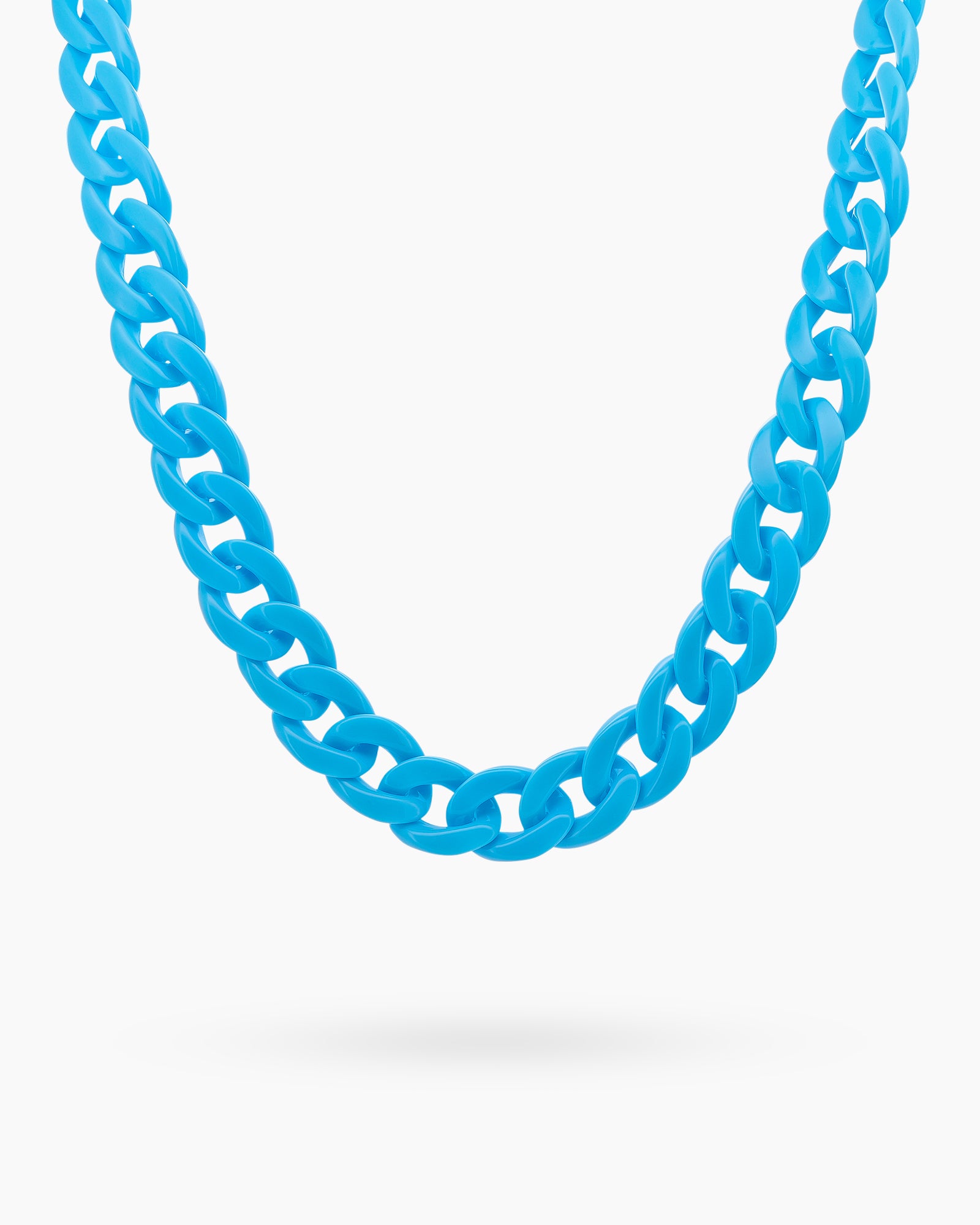 A glasses chain in blue with oversized, glossy color links for a playful and practical statement
