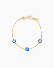 A light blue bracelet with a delicate gold-tone chain adorned with a glossy enamel daisy