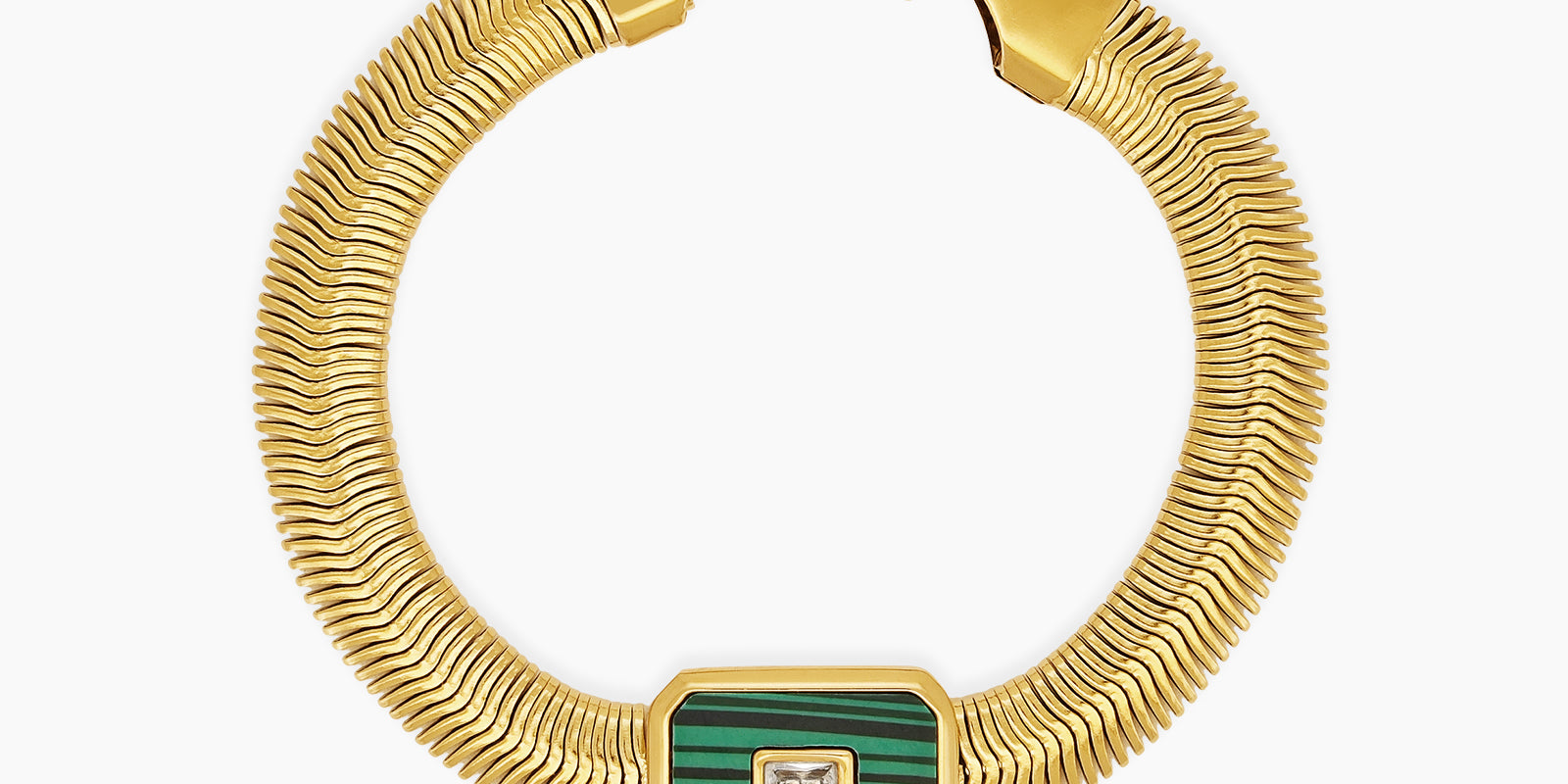 A green bracelet with a bold gold-tone snake chain and a rectangular malachite charm