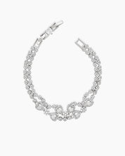 A radiant white vintage-style bracelet with two rows of zircons and five haloed heart-shaped centerpieces