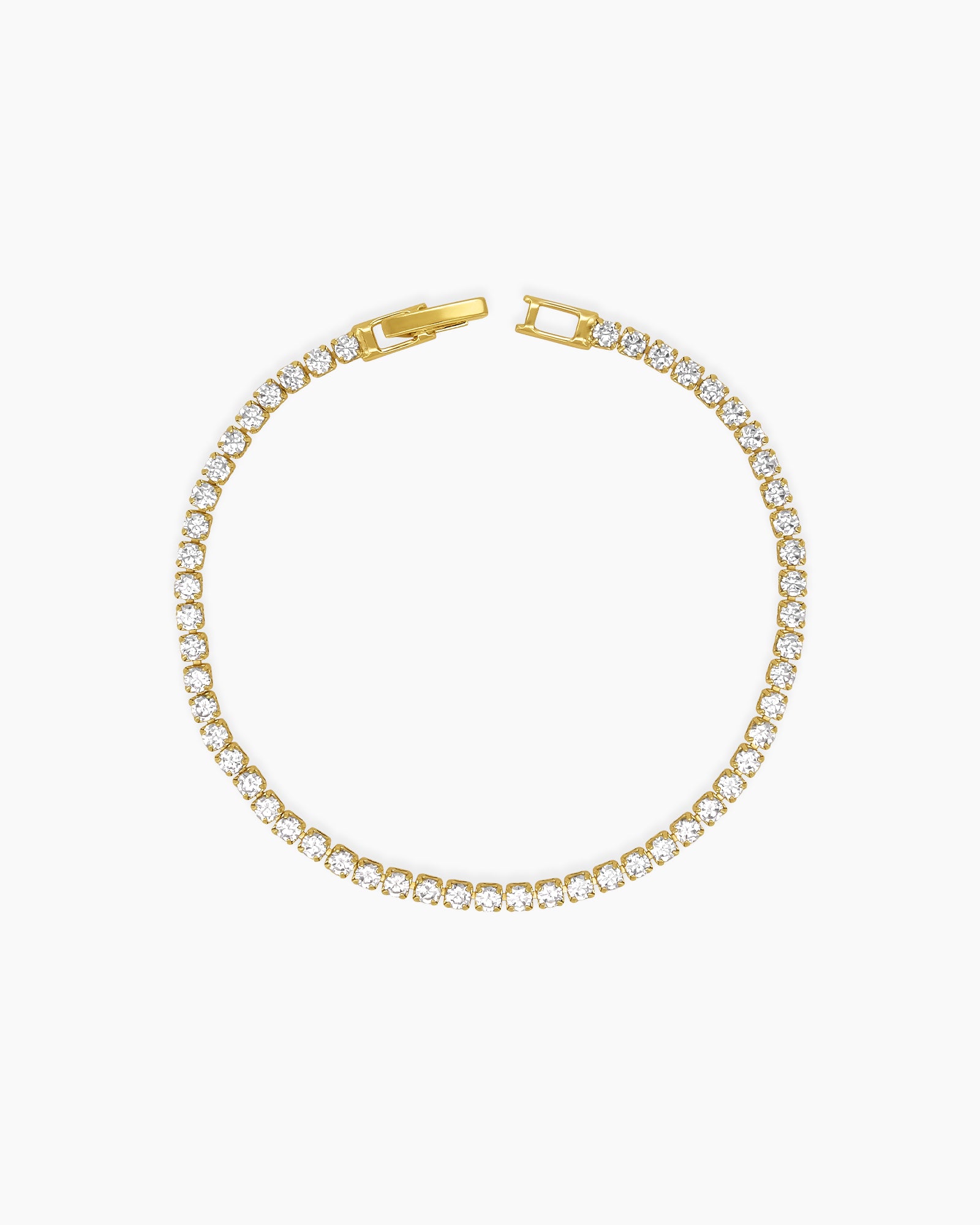 A sophisticated gold tennis bracelet with a single row of 2.5mm brilliant-cut zircon stones
