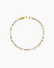 A sophisticated gold tennis bracelet with a single row of 2.5mm brilliant-cut zircon stones