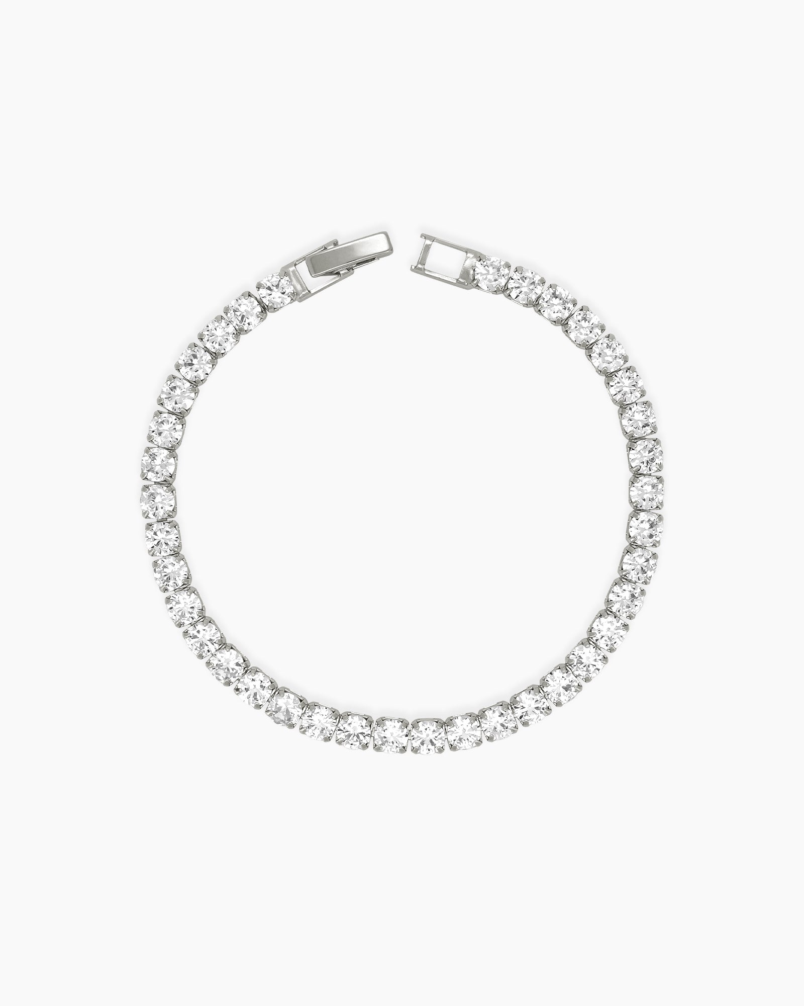 A sophisticated platinum tennis bracelet with a single row of 4mm brilliant-cut zircon stones