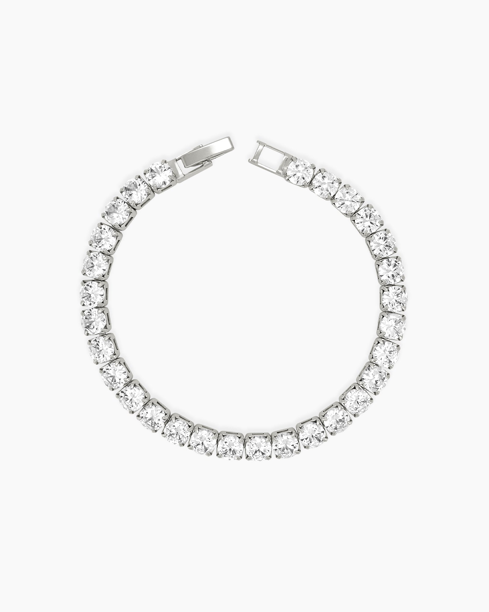 A sophisticated platinum tennis bracelet with a single row of 5mm brilliant-cut zircon stones