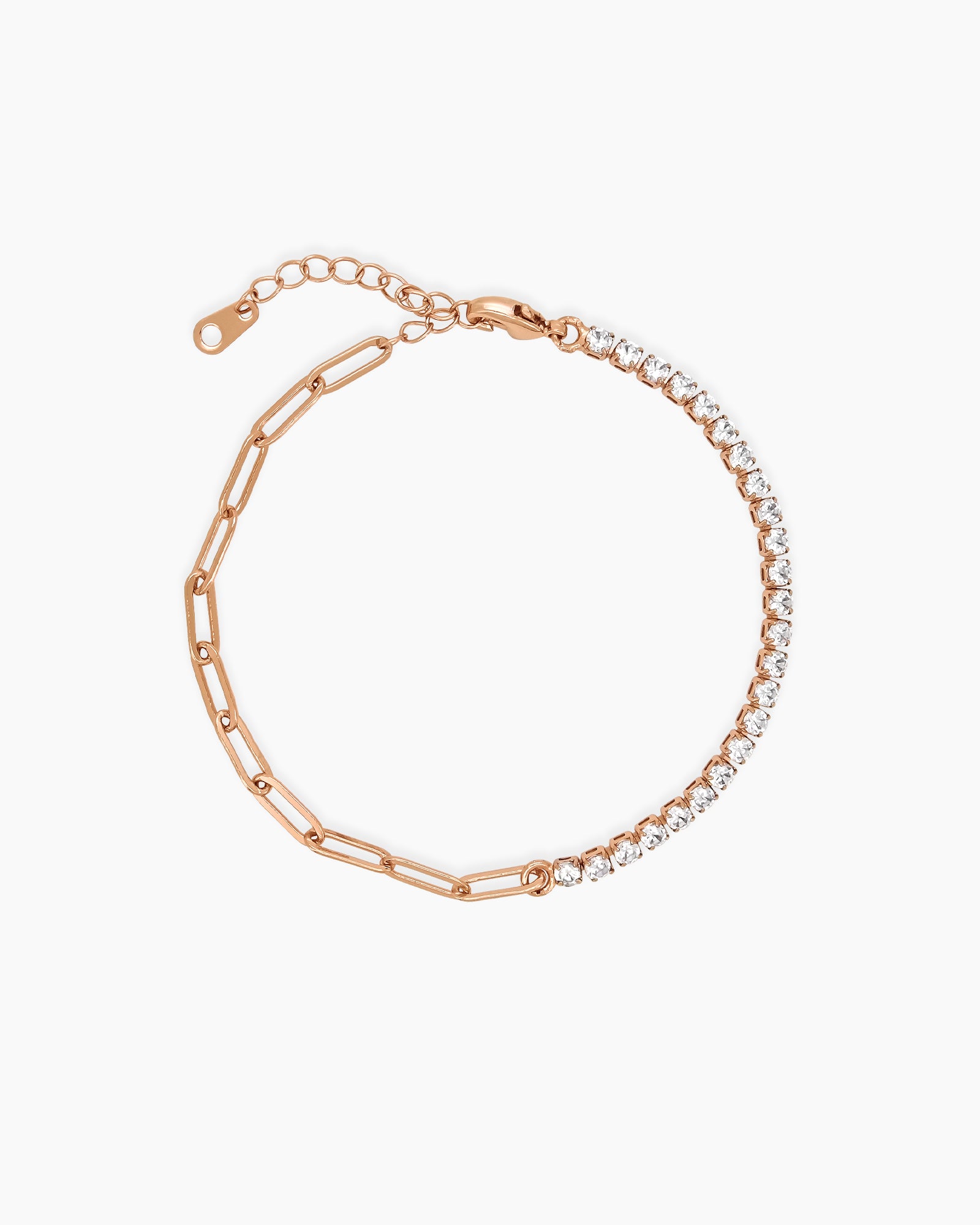 A rose-gold bracelet uniting a modern paperclip chain with the timeless elegance of a classic tennis setting