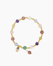 A stretch-fit bracelet with a radiant mix of multicolored crystal beads and a delicate Hamsa charm