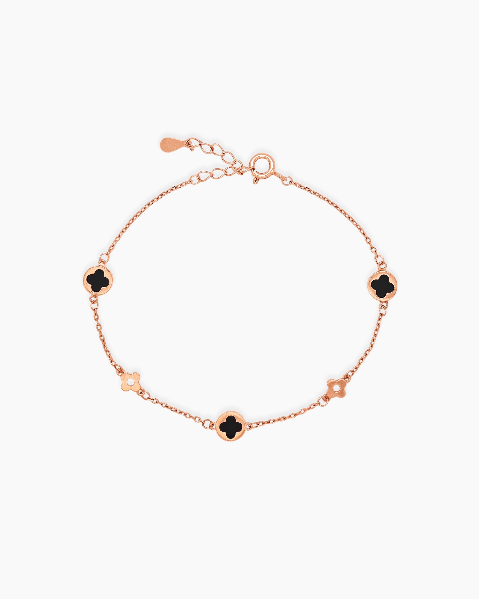 A Black Rose Gold bracelet with smooth, glossy stones cut into an iconic four-leaf clover form