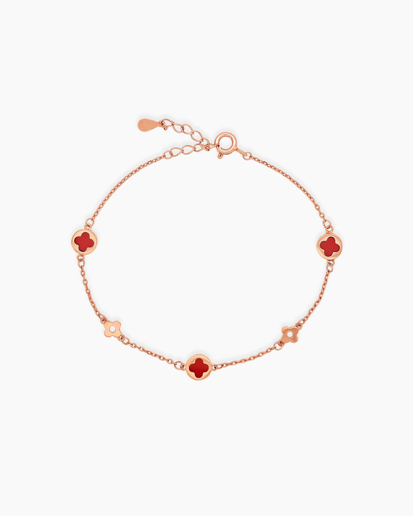 A Red Rose Gold bracelet with smooth, glossy stones cut into an iconic four-leaf clover form