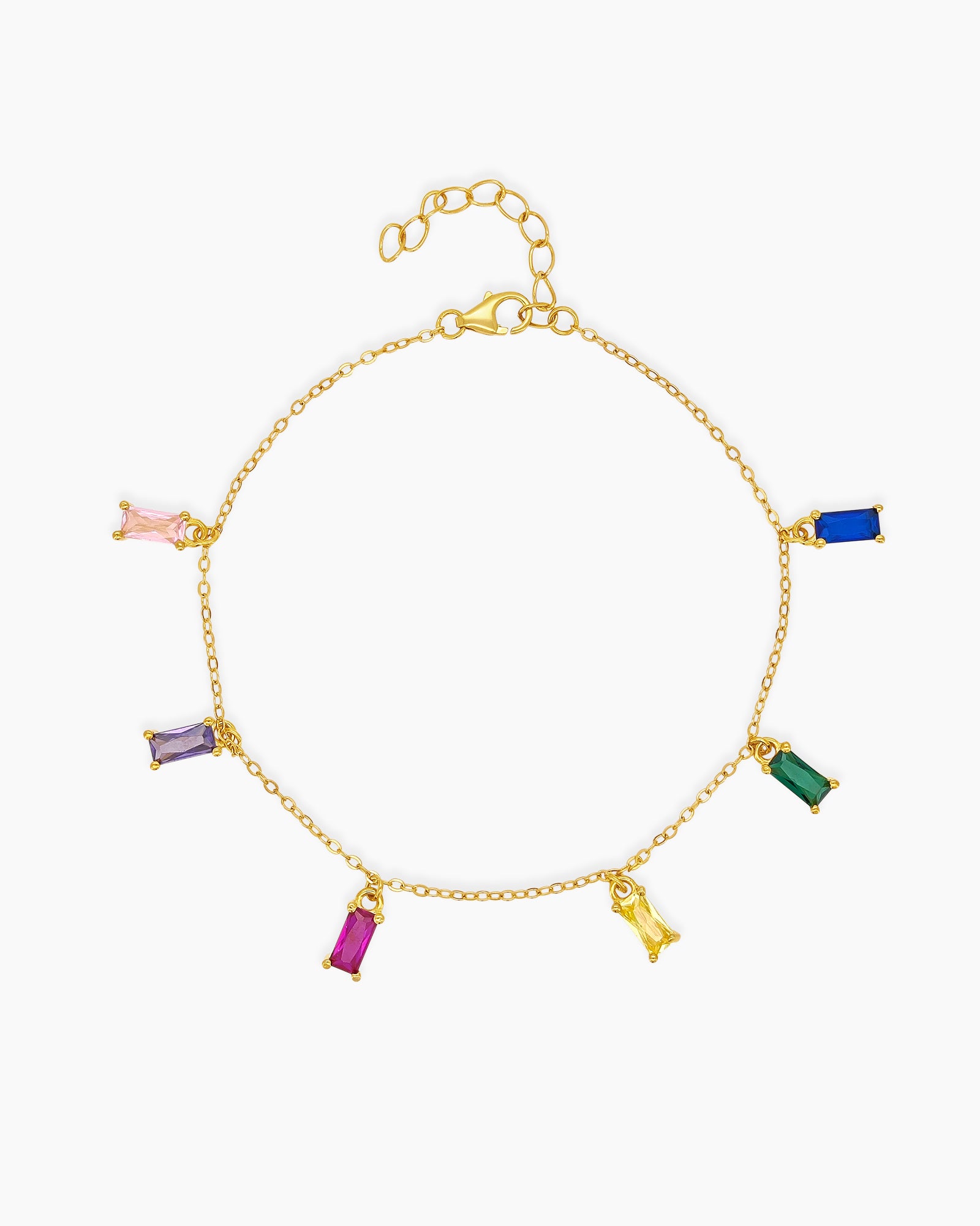 A gold bracelet with six multicolored zircon baguette-cut charms suspended on a delicate chain