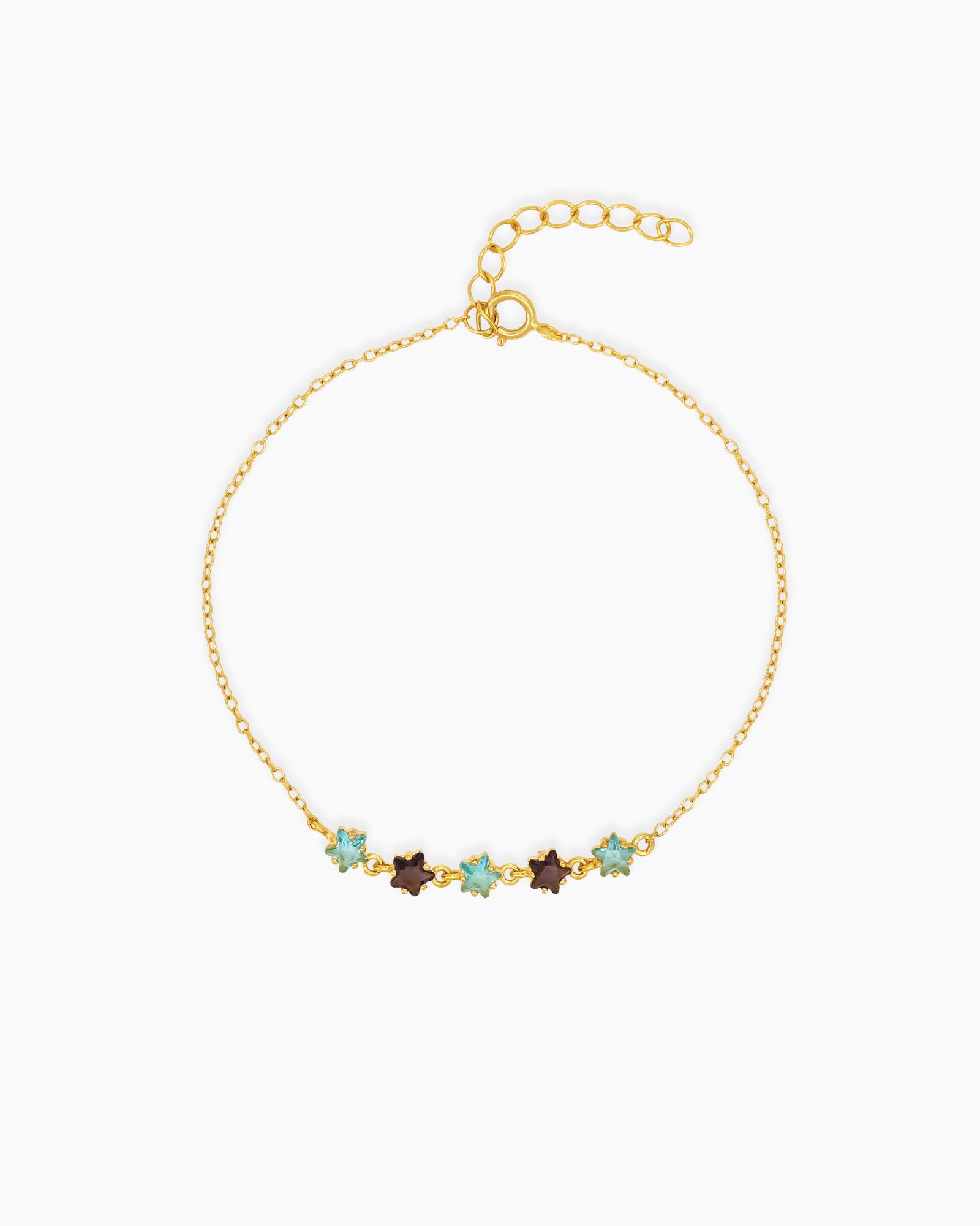A 925 sterling silver bracelet with a gold finish, dotted with tiny star-shaped zircons in pastel hues