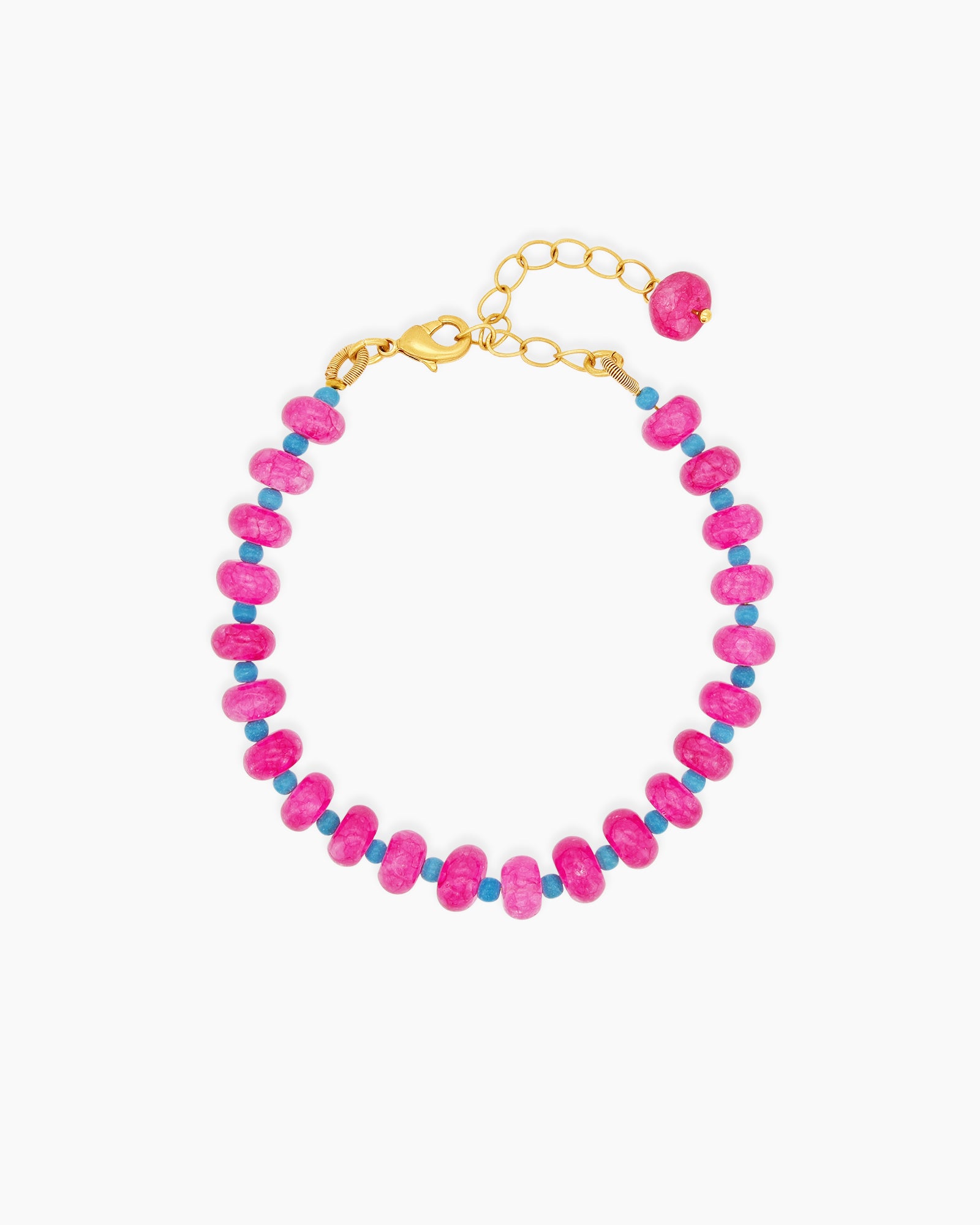 A bracelet with a striking palette of glossy pink quartz beads and turquoise spacers for a bold contrast