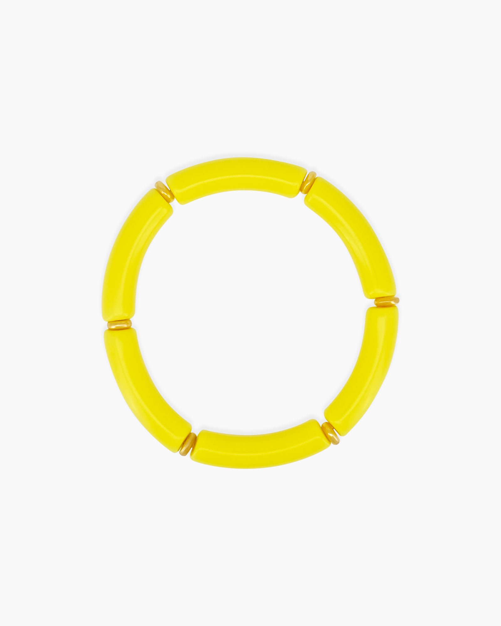 A playful lemon bangle with smooth, curved acrylic segments and delicate golden connectors