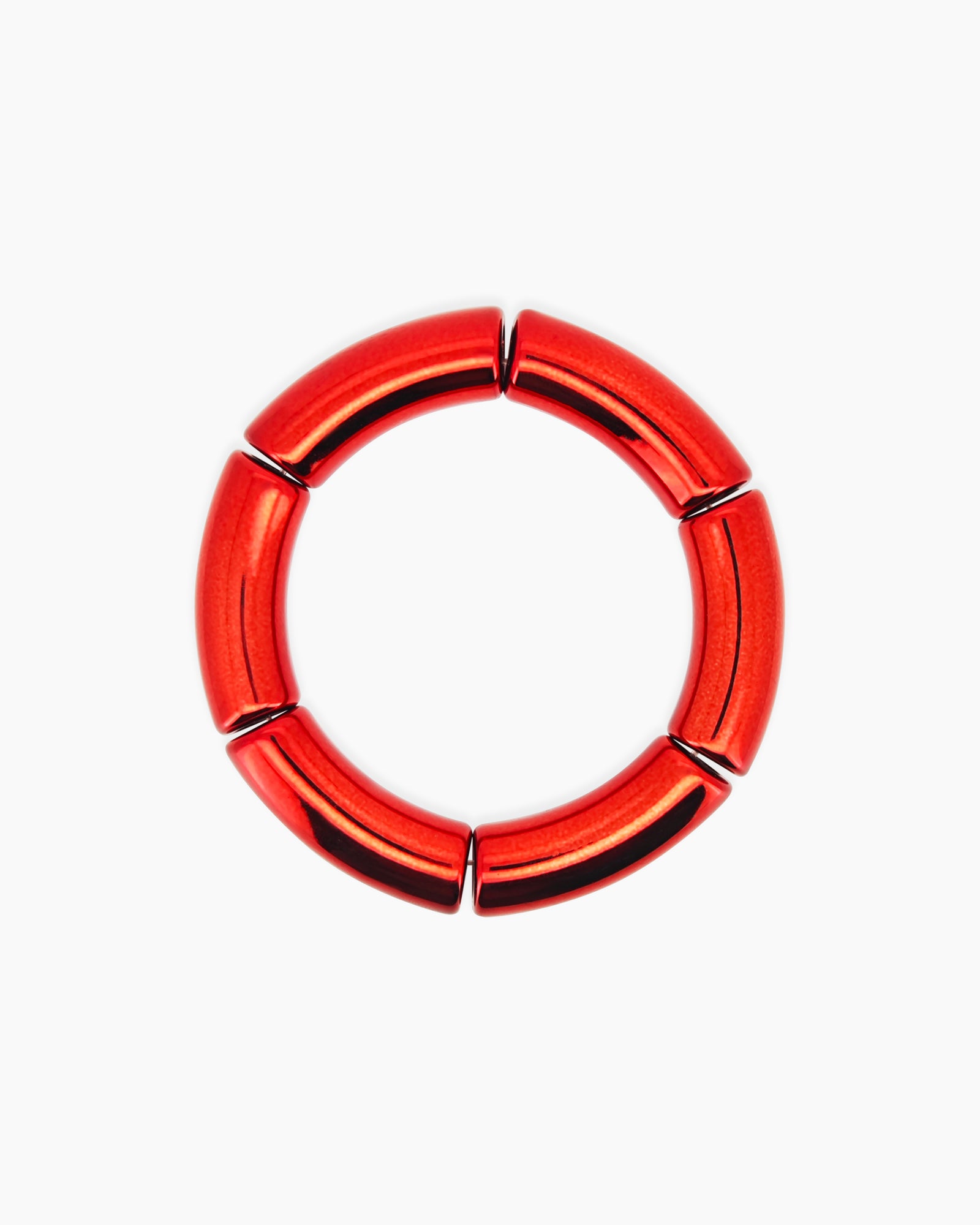 A radiant red bangle with a sleek tubular silhouette and a high-shine metallic finish