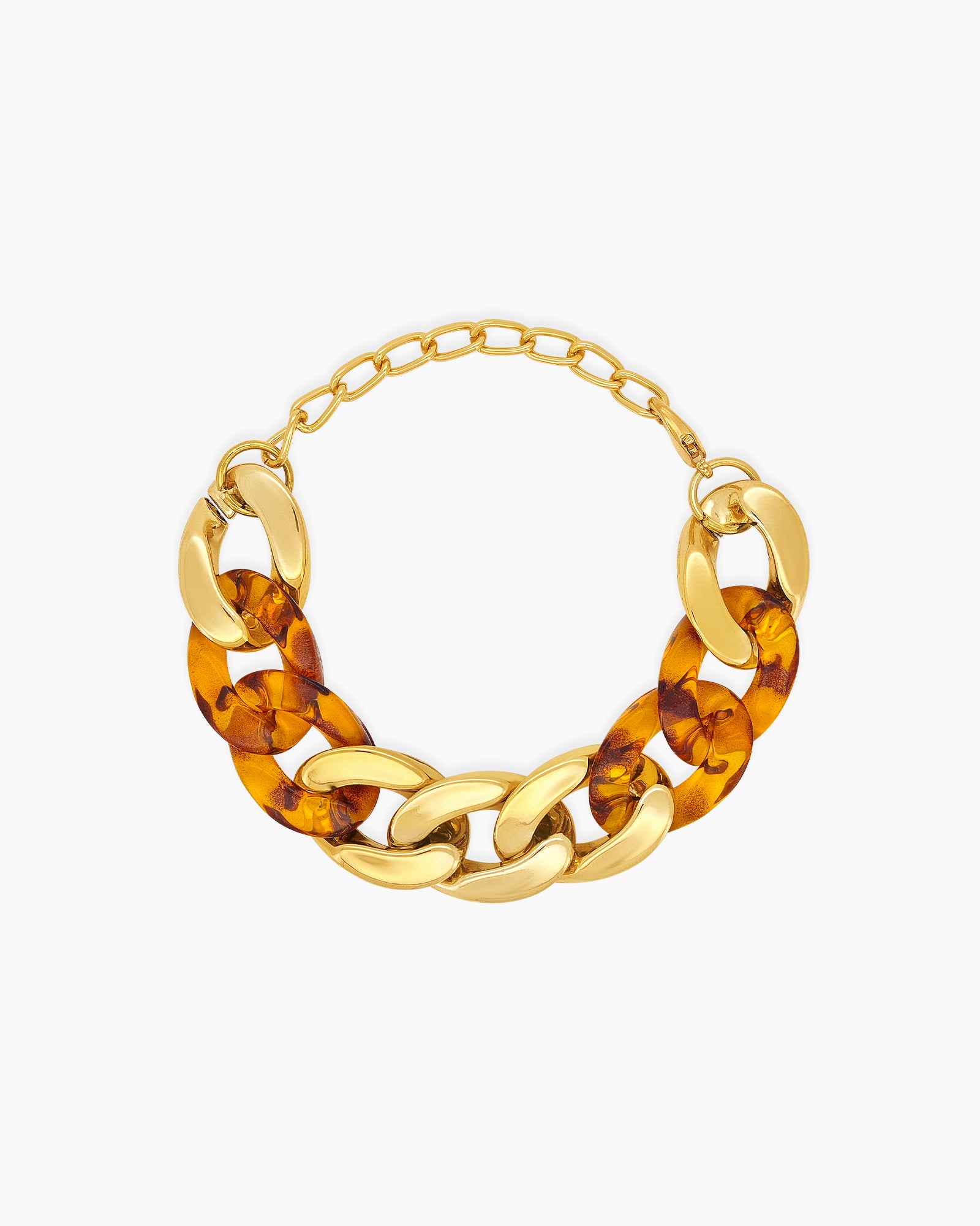 A bold leopard bracelet with chunky marbled acrylic links intertwined with high-shine gold-tone metal