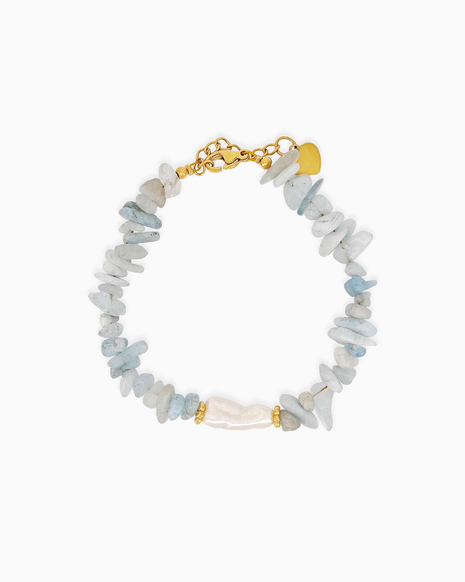 A bracelet of natural light-blue quartz chips, anchored by a luminous baroque pearl at its center