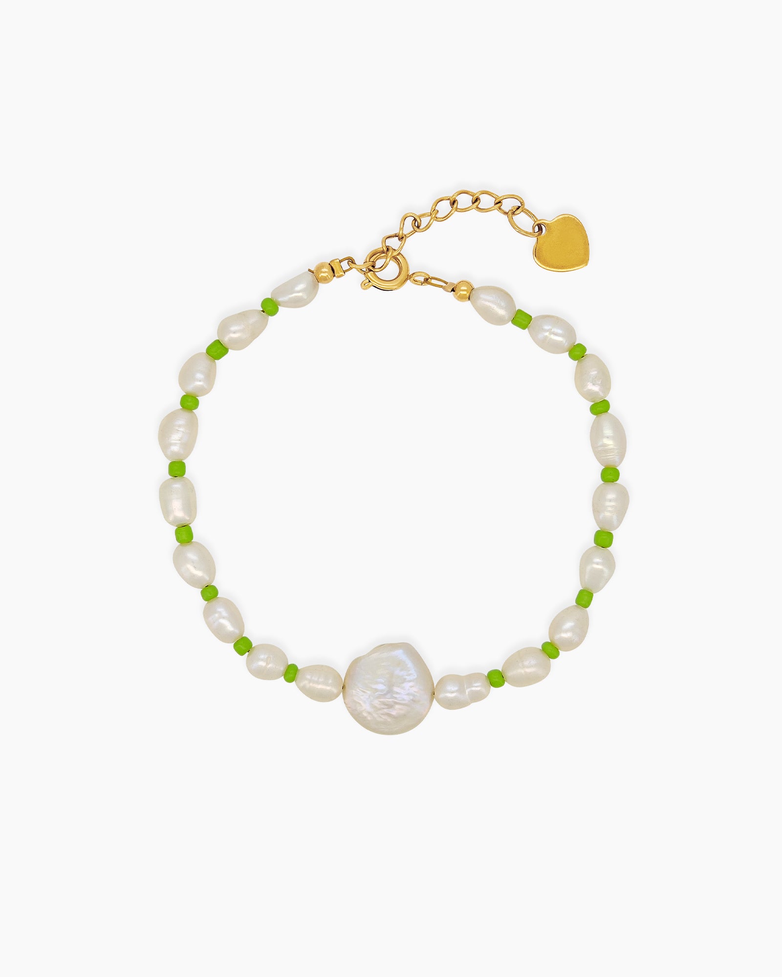 A bracelet of lustrous freshwater pearls, gently accented by vivid green seed beads for a fresh pop of color