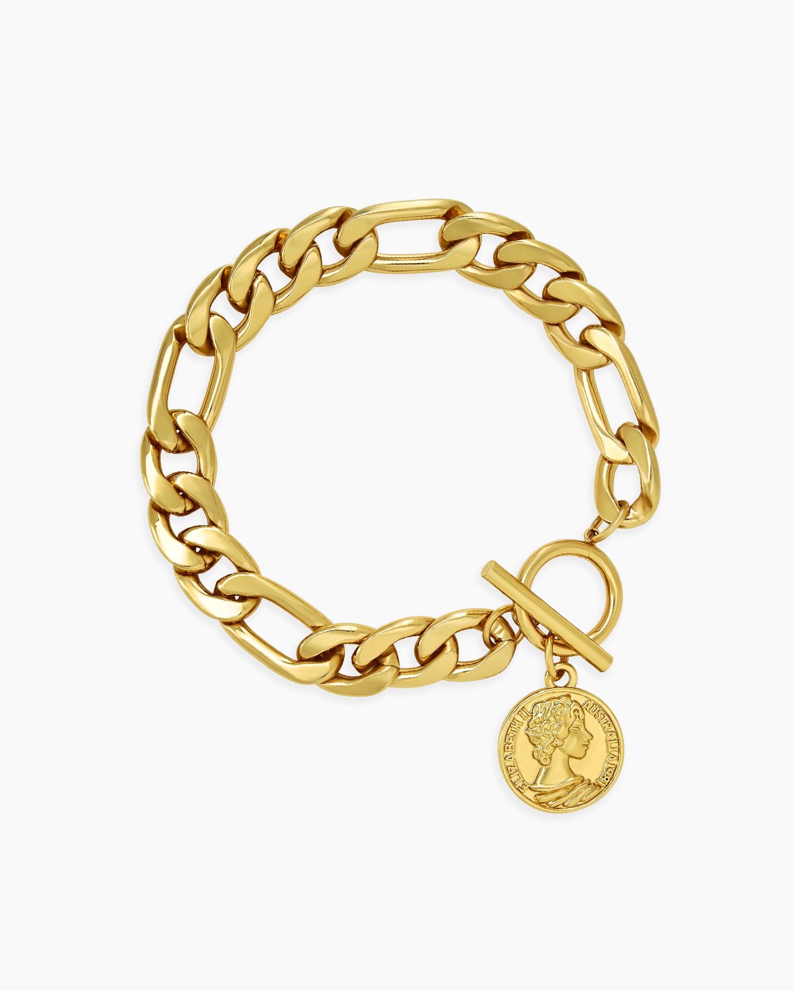 A gold bracelet with chunky chain links, a toggle clasp, and a medallion-style coin charm