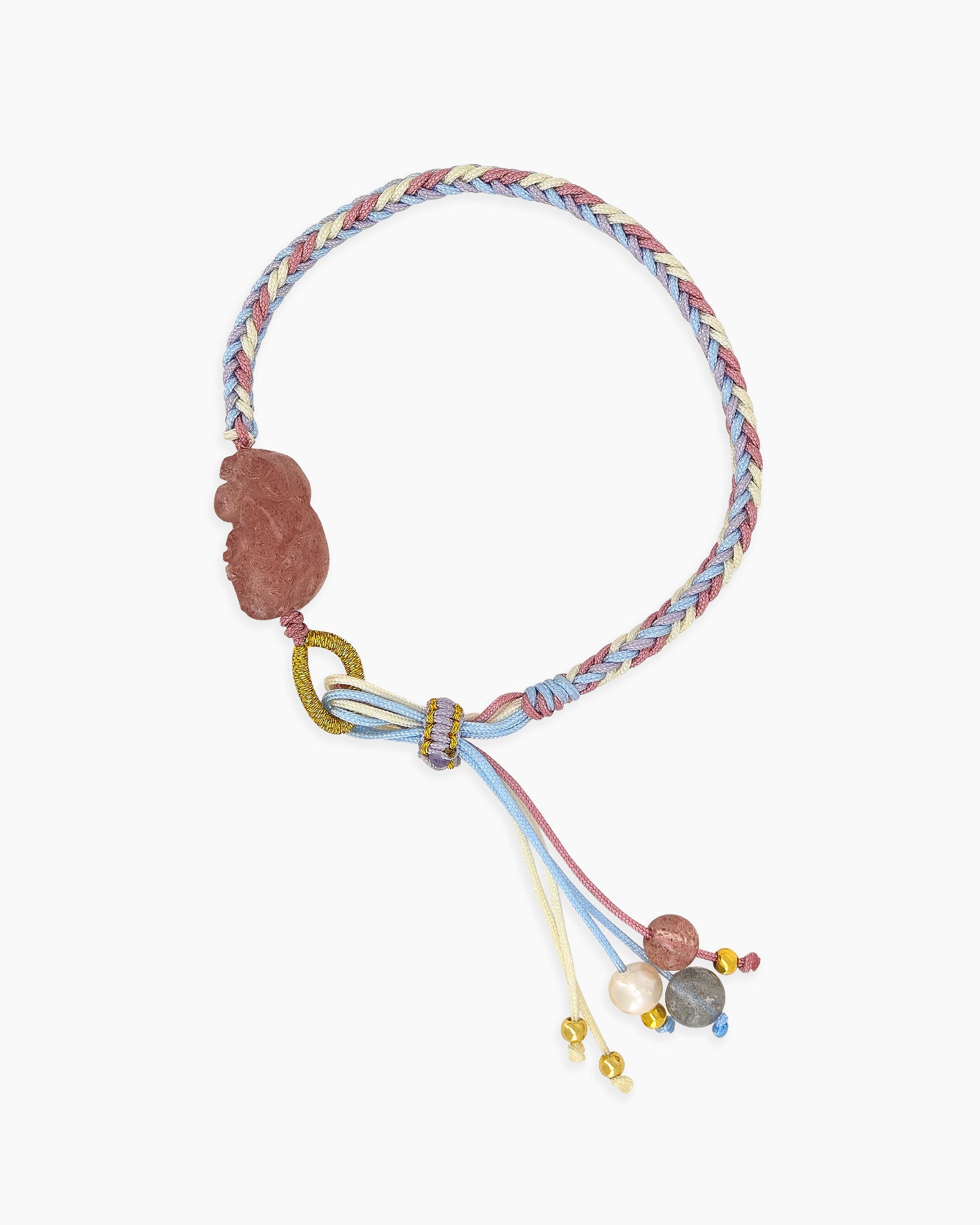 A hand-braided cord bracelet with a rose crystal Pixiu bead at its center for a serene look