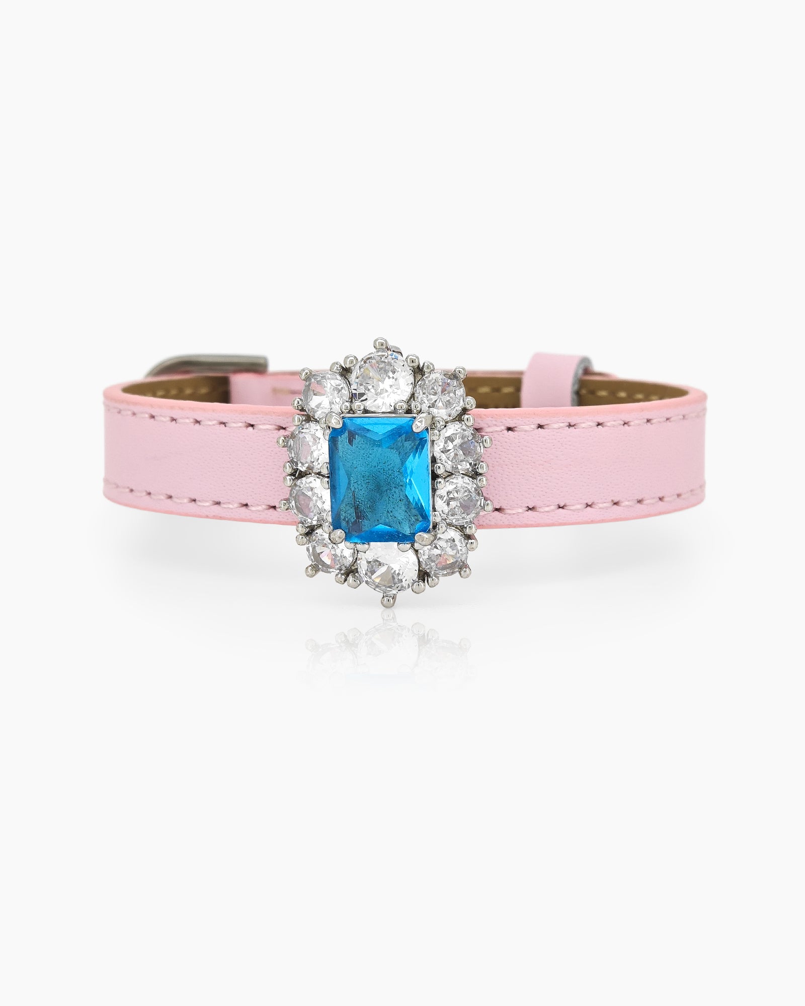 A pink-blue vintage-inspired bracelet with a dazzling center stone surrounded by radiant zircon accents