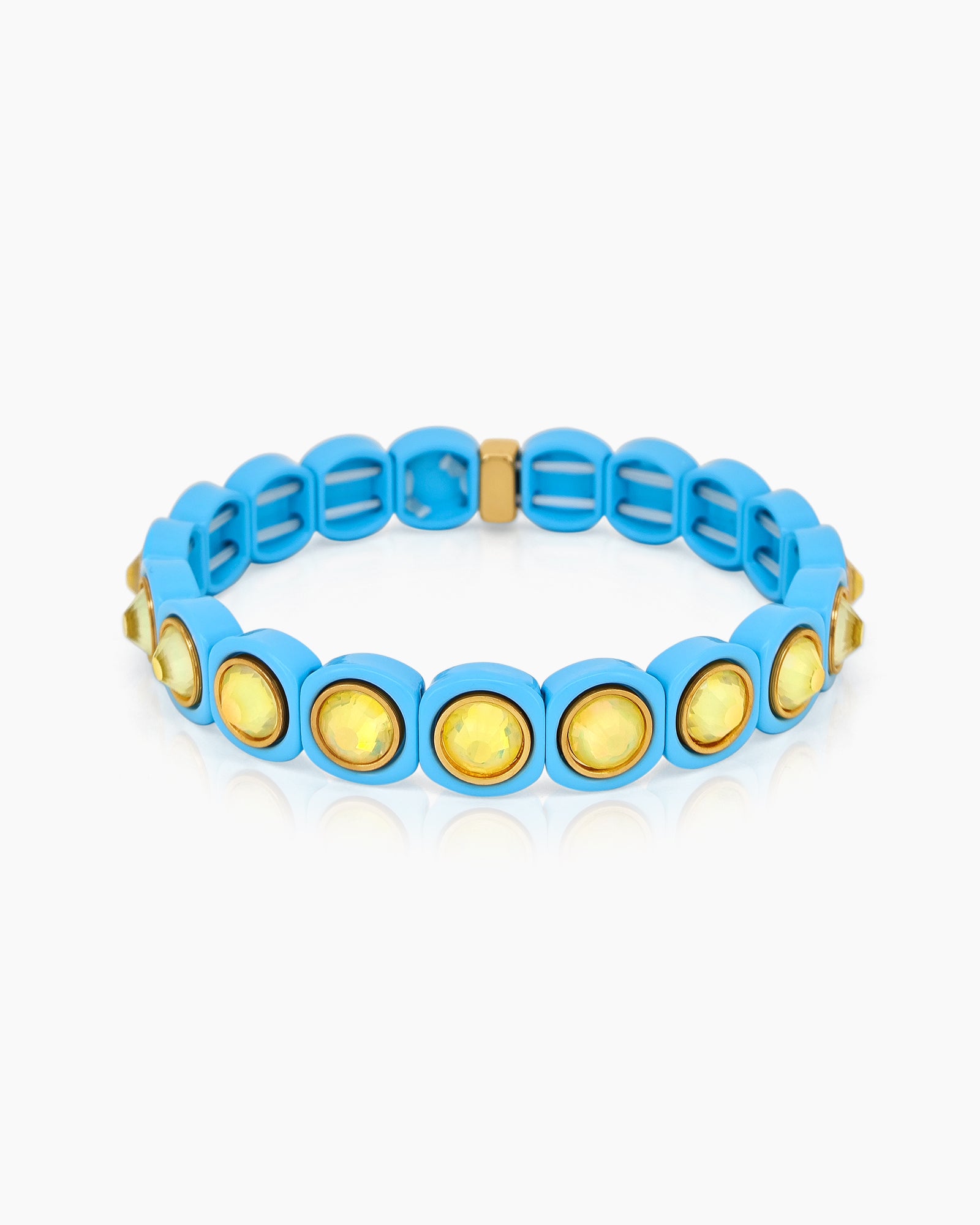 A blue-yellow stretch bracelet with glossy links set with iridescent crystal stones for a playful flair