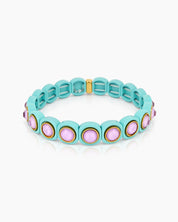 A mint-purple stretch bracelet with glossy links set with iridescent crystal stones for a playful flair