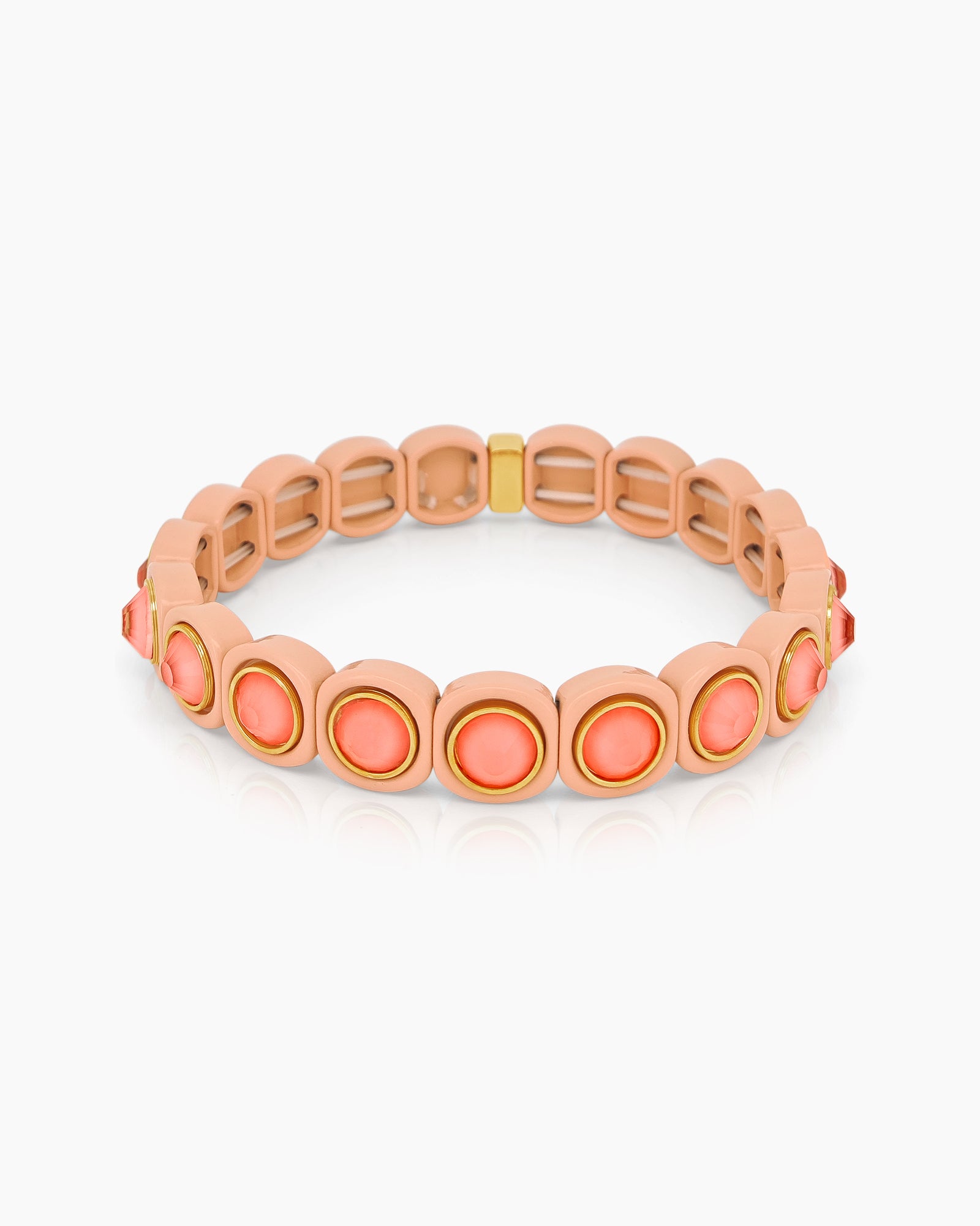 A peach-orange stretch bracelet with glossy links set with iridescent crystal stones for a playful flair