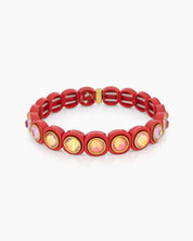 A red-white stretch bracelet with glossy links set with iridescent crystal stones for a playful flair