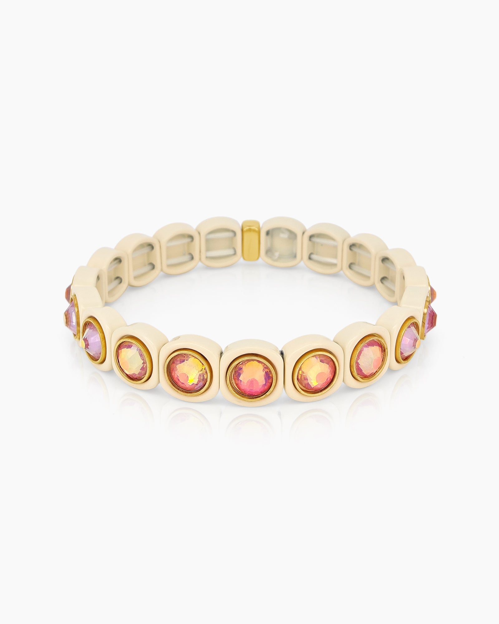 A white-pink stretch bracelet with glossy links set with iridescent crystal stones for a playful flair