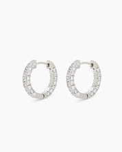 Chunky platinum-white hoops with two radiant rows of pavé-set zircons for dazzling, daily glam