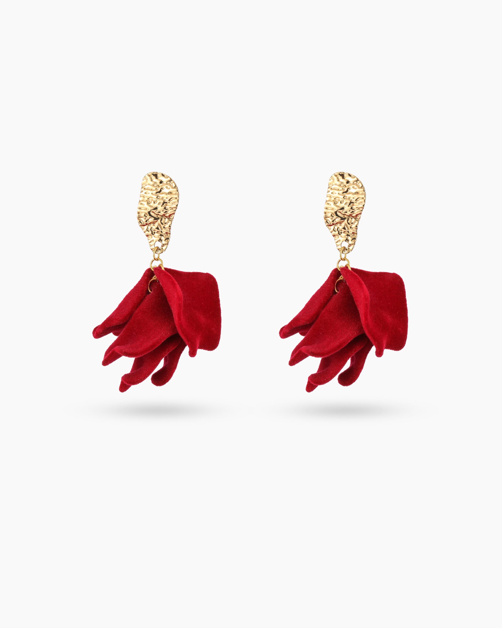 Earrings with a cascade of deep crimson velvet petals suspended from hammered gold-tone studs