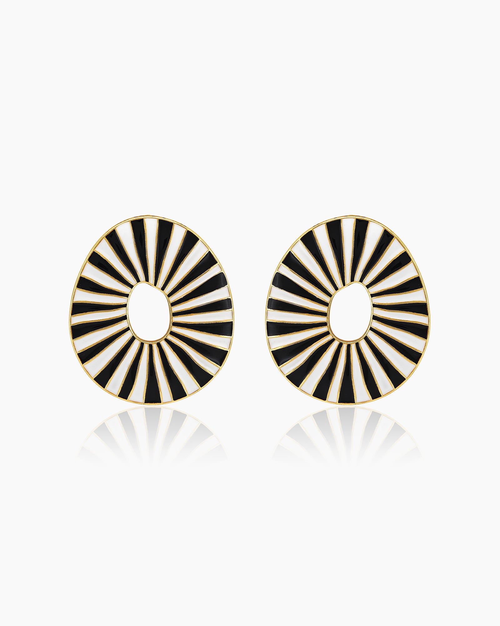 Black oval earrings with radiant enamel stripes in a sunburst pattern for a retro glamour look