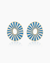 Light-blue oval earrings with radiant enamel stripes in a sunburst pattern for a retro glamour look