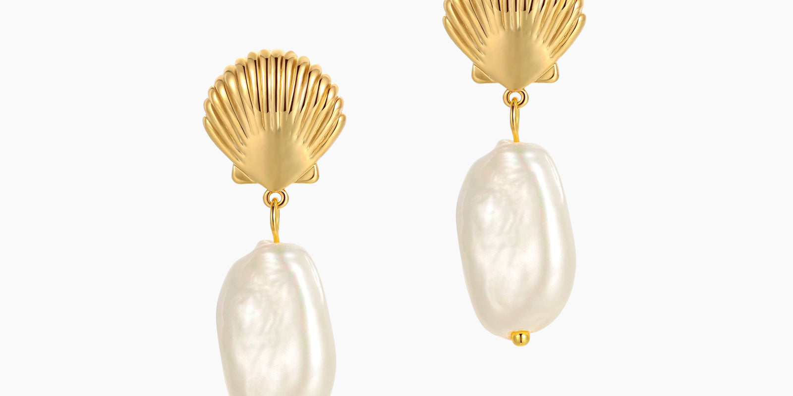 Earrings with a gleaming gold shell stud and a modern, organic baroque freshwater pearl drop
