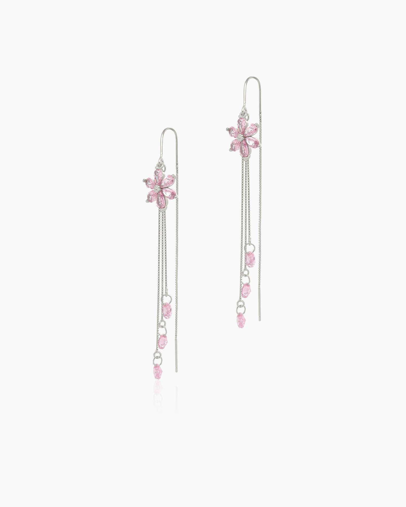 Pink tassel earrings with pink-hued zircon blossoms and cascading silver-tone chains